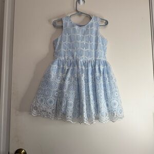 Pippa and Julie lights blue and white dress.